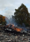 Image of bonfire on demolition site